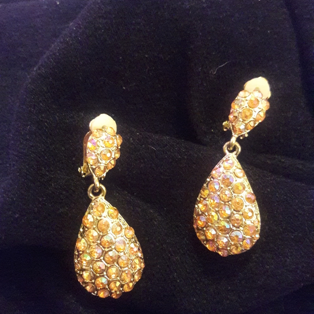 Clip on orange iridescent  earrings new w/o tags
